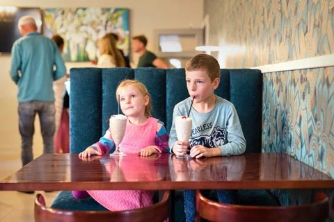 Kids Drinking Milkshake at Feathers & Flatcaps Montagu Restaurant Kids Drinking Milkshake at Feathers & Flatcaps Montagu Restaurant
